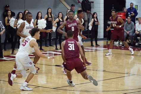 Holy Cross Swarms Men's Basketball, Hands Crimson Second Loss | Sports ...