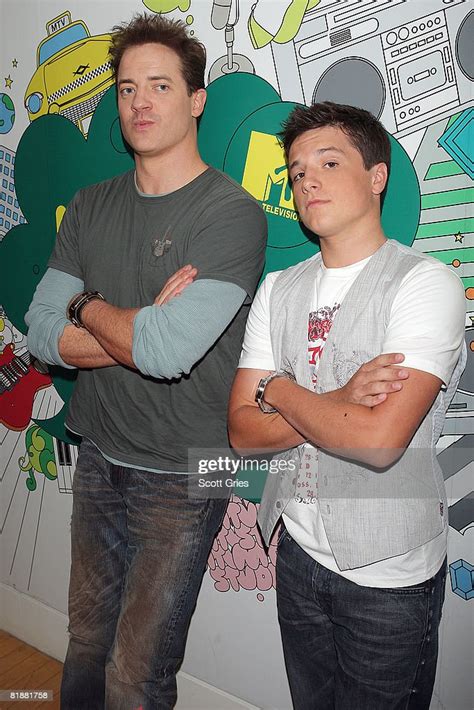 Actors Brendan Fraser and Josh Hutcherson pose for a photo backstage ...