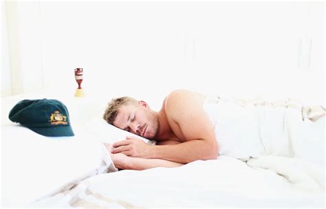 PHOTOS: David Warner sleeps with the Ashes urn - Rediff Cricket