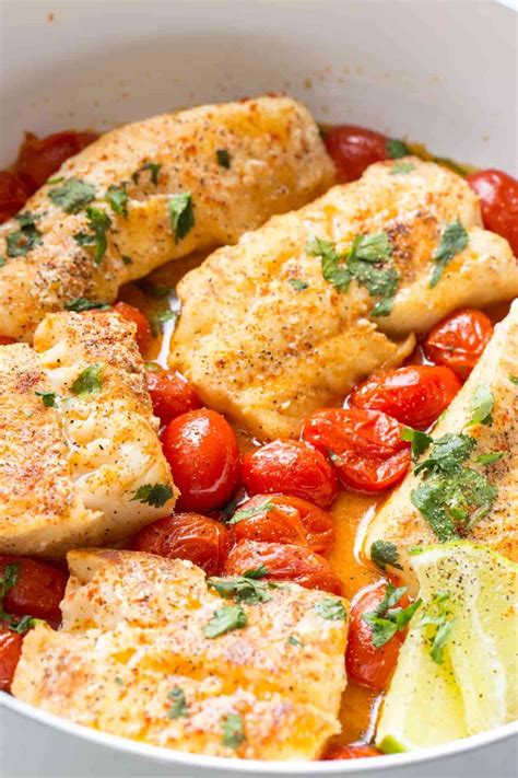 Simple cod recipe with tomatoes in a buttery wine sauce. | Haddock fillet recipe, Cod fish ...