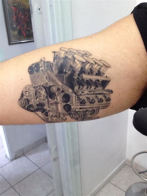 Realistic tattoo (Nissan motor V8), healed. By André Tenório. | Tatuagem braço mecânico ...