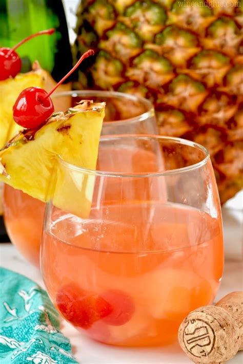 This Pina Colada Rum Punch is the perfect easy recipe for your parties! With only FOUR ...