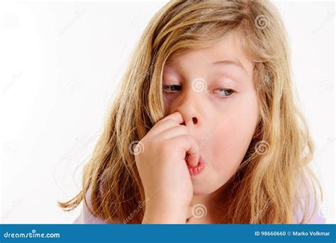 Funny girl picking in nose stock photo. Image of female - 98660660