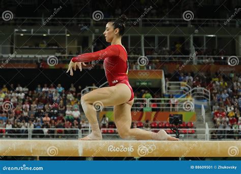 Olympic Champion Aly Raisman of United States Competing on the Balance Beam at Women`s All ...