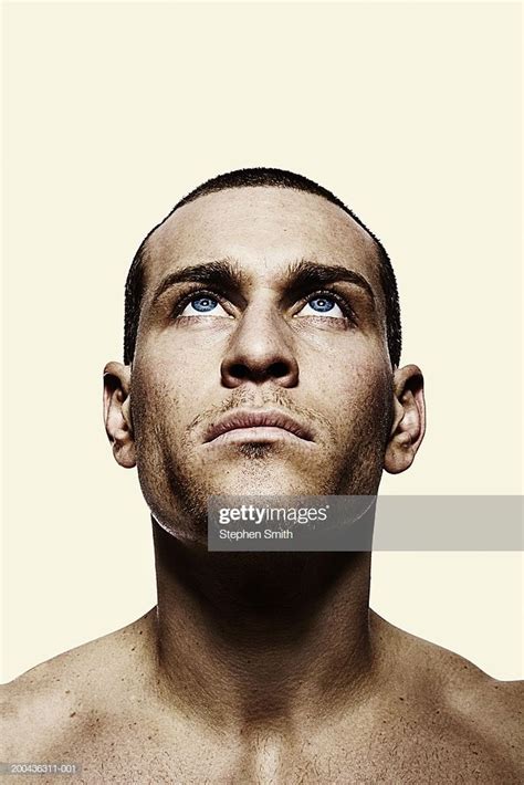 Stock Photo : Young man looking up, close up | Man looking up, Face angles, Human poses reference