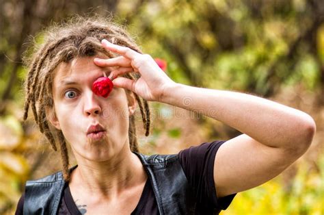 Funny Man with Dreadlocks Holds a Flower Stock Photo - Image of ...