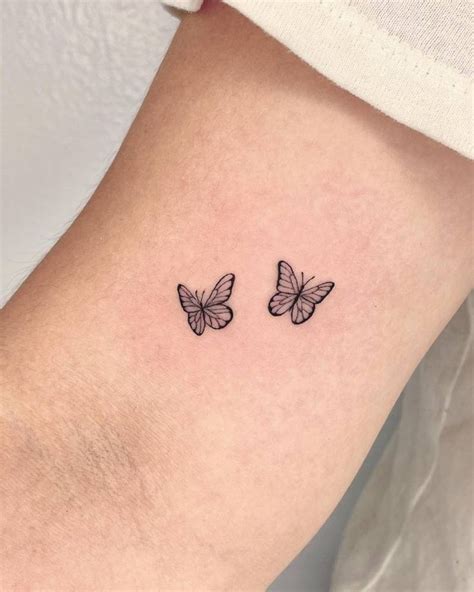 Minimalistic style butterfly couple tattoo located on | Small meaningful tattoos, Couples tattoo ...