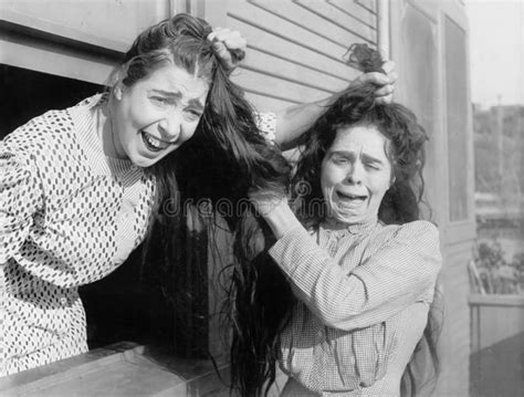 Two Women Fighting And Pulling Each Others Hair Stock Photo - Image ...