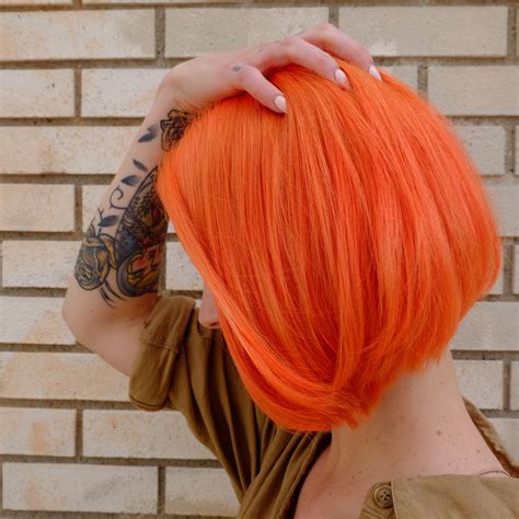 Vibrant Neon Orange Hair