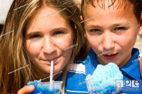 Kids eating carnival food, Stock Photo, Picture And Royalty Free Image ...