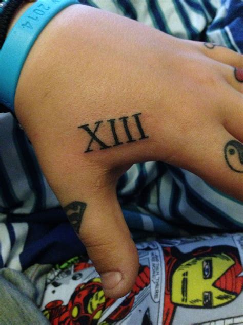 This is Roman numerals for 13 which is my lucky number. I got this ...