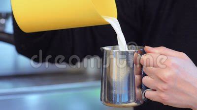 Female Pour Milk for Coffee into Milk Pitcher Stock Footage - Video of inside, pour: 116836452