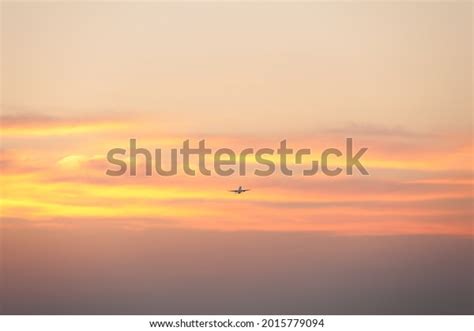 Airplane Taking Off On Sunset Background Stock Photo 2015779094 ...