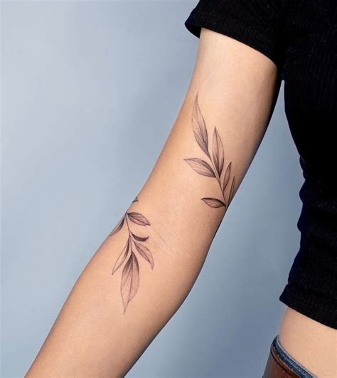 a really beautiful leaf tattoo on We Heart It | Around arm tattoo, Vine ...