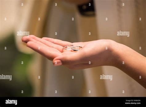 Bride and groom rings at the ceremony Stock Photo - Alamy