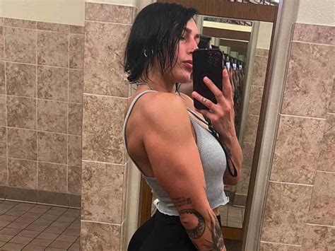 "Holy shi*t back muscles" Fans flabbergasted as Rhea Ripley shares intense back workout video