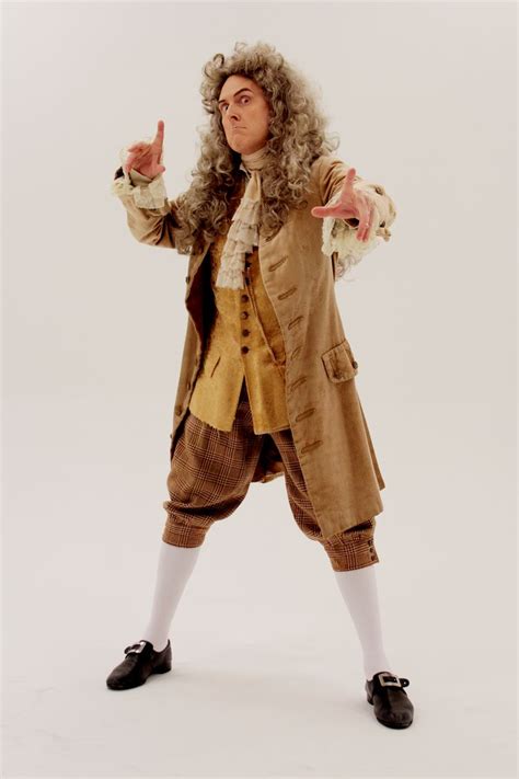 a man dressed in an old fashion outfit with long curly hair and white socks, holding his hands ...