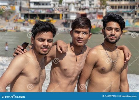 A Group of Boys Pose for a Photo while Swimming in the Ganges River. Editorial Stock Photo ...