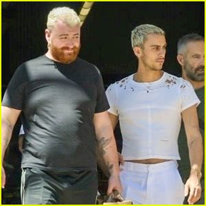 Sam Smith & Boyfriend Christian Cowan Find Harmony in Coordinating Black & White Looks ...