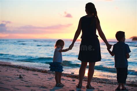 Family at sunset stock photo. Image of daughter, mother - 18195964