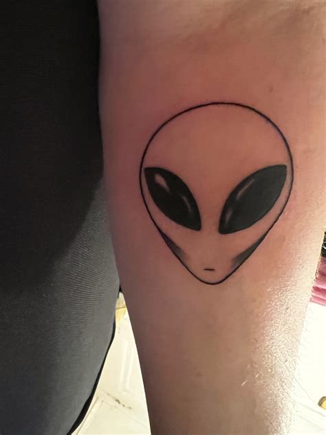 Alien Face Tattoo