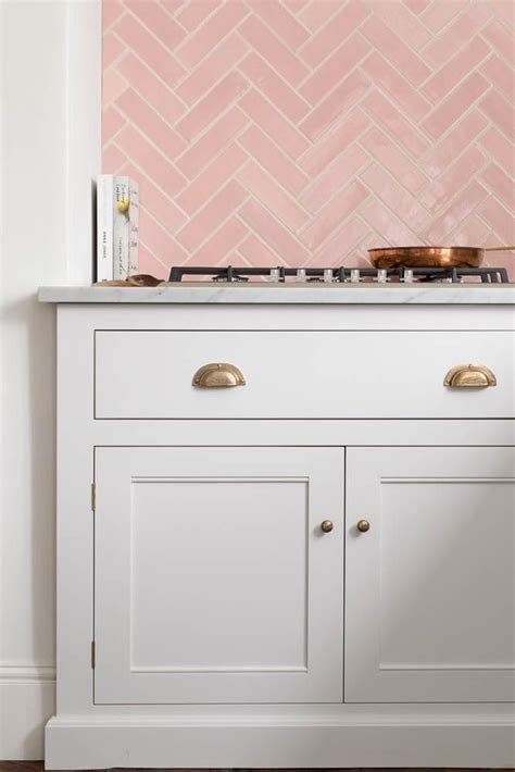 Our Pretty Pink Handmade Tiles have been teamed here with a Damask Shaker kitchen by deVOL and w ...