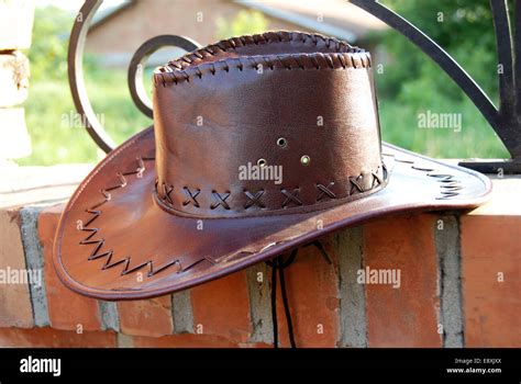 Brown cowboy hat Stock Photo - Alamy