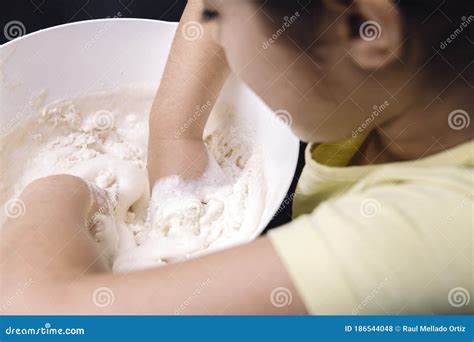 Child Mixing Flour in Bowl To Make Homemade Bread Stock Photo - Image ...