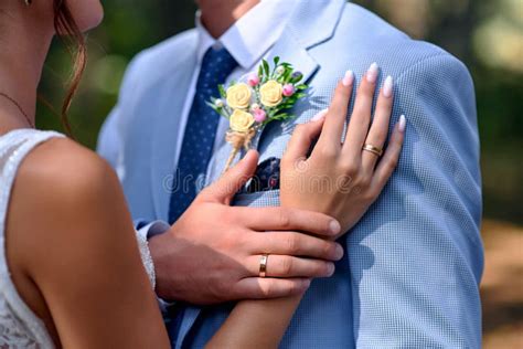 Wedding rings on hands stock photo. Image of engagement - 262245606