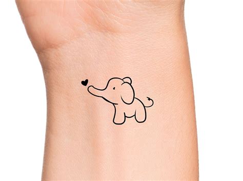 Baby Elephant Silhouette Tattoo