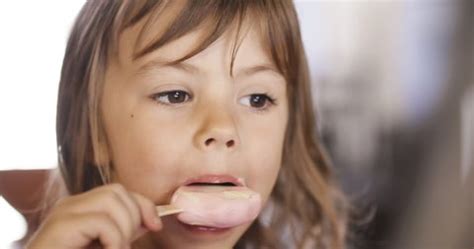 Adorable Little Girl Sitting On Chair Stock Footage Video (100% Royalty ...