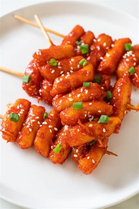 Deep Fried Korean Rice Cake Tteokbokki Skewered with Spicy Sauce Stock ...