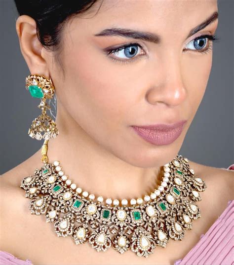 Diamond emerald necklace and jhumkas set - Indian Jewellery Designs