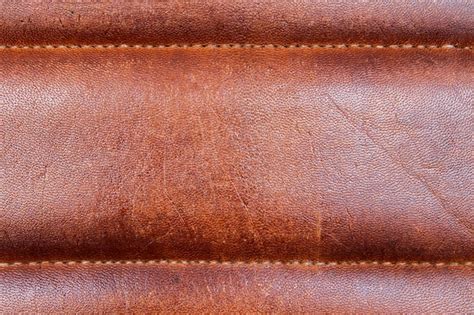 Premium Photo | Reddish brown leather closeup