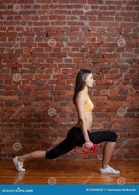 Girl Doing Lunges With Dumbbells Stock Photo - Image of energy, positive: 63968220