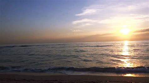 Sunrise Beach with Boat in the Horizon Stock Video Footage - VideoBlocks | Sunrise beach ...