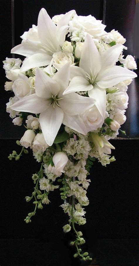 White Lily and Rose Wedding Bouquet in 2021 | Flower bouquet wedding, Lily bouquet wedding ...