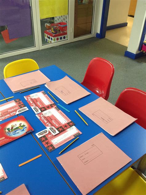 Set up for RWI lesson with red ditty books and busy books where the ...