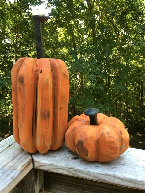 Hand carved wooden pumpkins | Wooden pumpkins, Fall halloween crafts ...