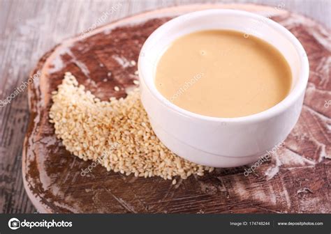 Tahini paste - sesame sauce Stock Photo by ©manyakotic 174748244