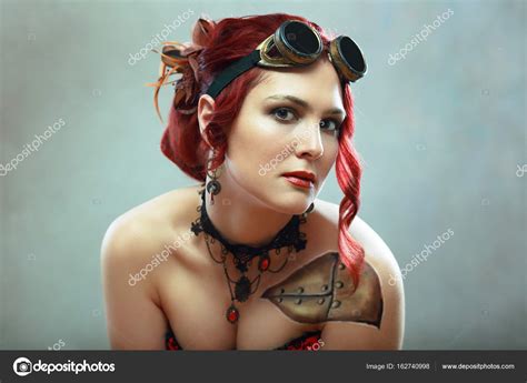 Redhead steampunk woman Stock Photo by ©lenanet 162740998