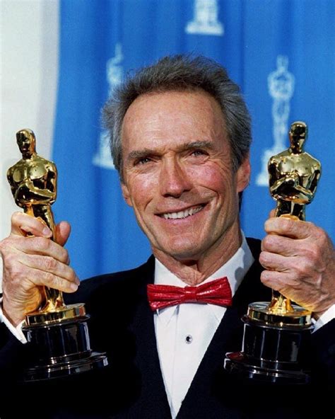 Clint Eastwood on Instagram: “Clint Eastwood couldn't be happier holding his first two Oscars ...