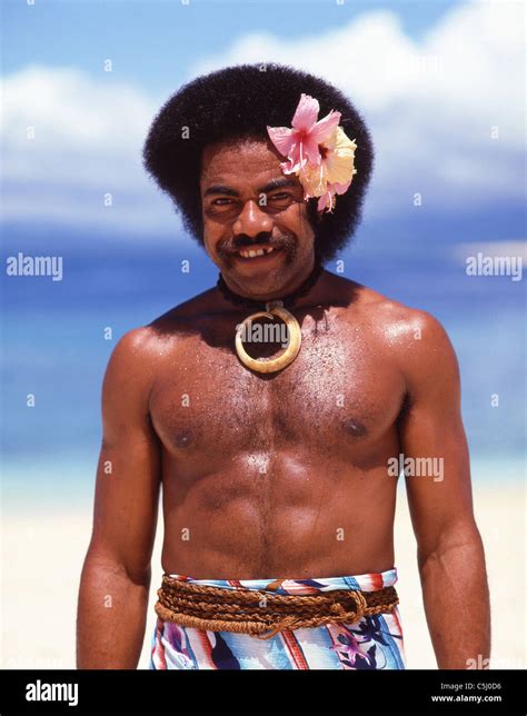 Fijian native on beach, Beachcomber Island Resort, Mamanuca Islands ...