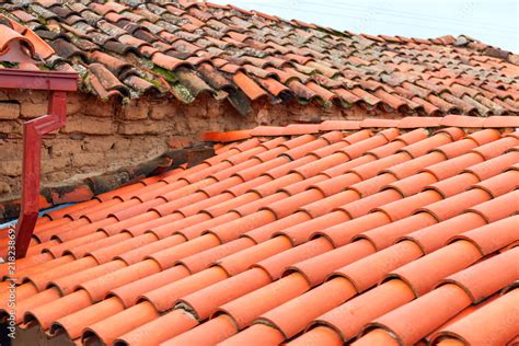 Old red brick roof tiles of Italian houses Stock Photo | Adobe Stock