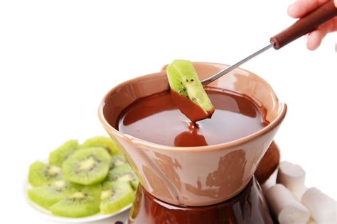 Premium Photo | Chocolate fondue with fruits isolated on white