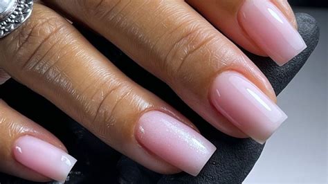 Strawberry Milk Nails Are The Pastel Pink Manicure Trend That's Perfect For Spring