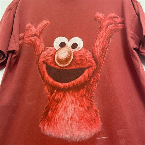 Vintage Sesame Street Elmo MonsterWear Tee On Changs... - Depop