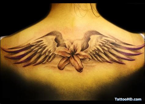 Angel Wings Tattoos Meaning | Angel wings tattoo, Wings tattoo meaning, Heart with wings tattoo