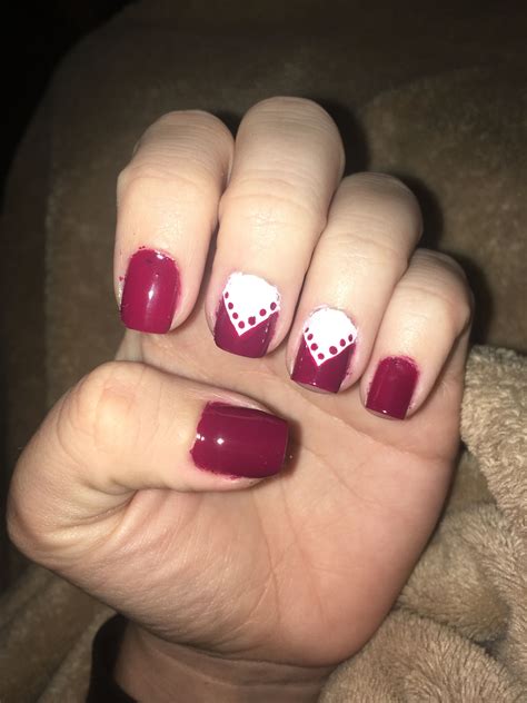 Maroon nails with white accent | Maroon nails, Fun nail colors, Nails