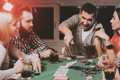 Young Friends Playing Poker on Party at Home. Stock Image - Image of ...